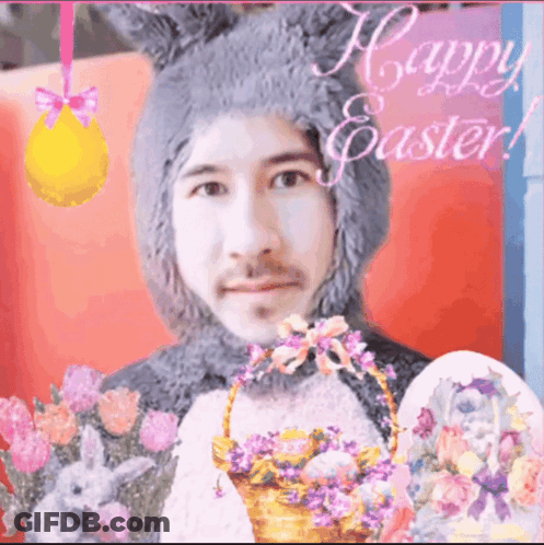 A Man In A Bunny Costume Is Holding An Easter Basket With Flowers GIF