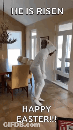 A Man In A Bunny Suit Is Dancing In A Living Room . GIF