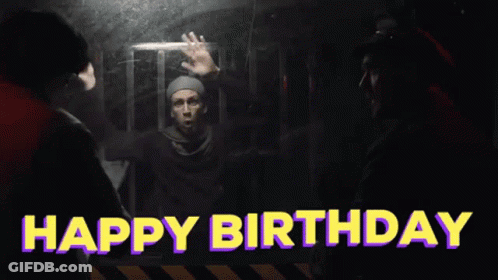 A Man In A Cage With The Words Happy Birthday Above Him GIF