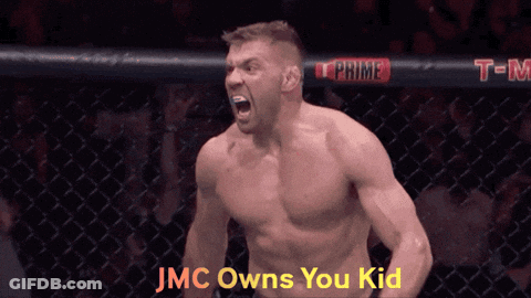 A Man In A Cage With The Words " Jmc Owns You Kid " On The Bottom GIF