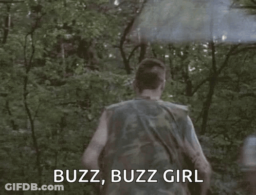A Man In A Camouflage Shirt Is Running Through A Forest With A Smoke Bomb Coming Out Of His Head . GIF