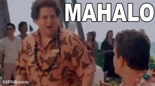 A Man In A Camouflage Shirt Is Talking To Another Man In Front Of A Group Of People . GIF
