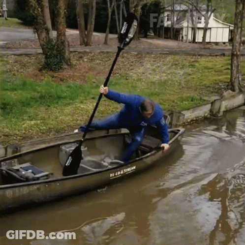A Man In A Canoe With A Paddle That Says Prada Stream On It GIF