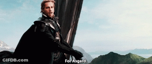 Man In Cape Standing Before Mountain Says For Asgard GIF