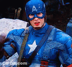 A Man In A Captain America Costume Is Wearing A Blue Helmet With The Letter A On It . GIF