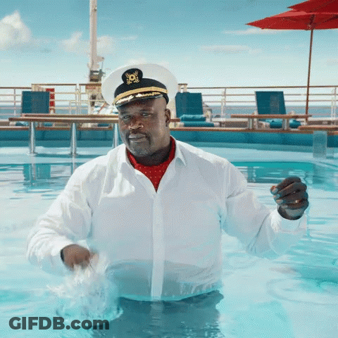 A Man In A Captain 'S Hat Is In A Swimming Pool GIF