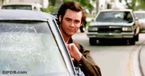 A Man In A Car With A Broken Windshield GIF