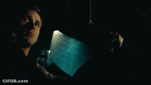 A Man In A Car With The Word Drive Written On The Screen GIF