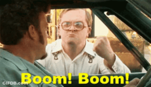 A Man In A Car With The Words Boom Boom On The Bottom GIF