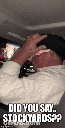 A Man In A Car With The Words Did You Say Stockyards On The Bottom GIF