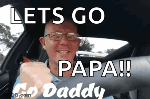 A Man In A Car With The Words Let 'S Go Papa Go Daddy Above Him GIF
