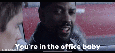A Man In A Car With The Words You 'Re In The Office Baby On The Screen GIF