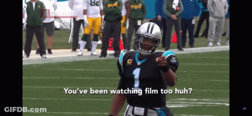 A Man In A Carolina Panthers Uniform Points At The Camera GIF