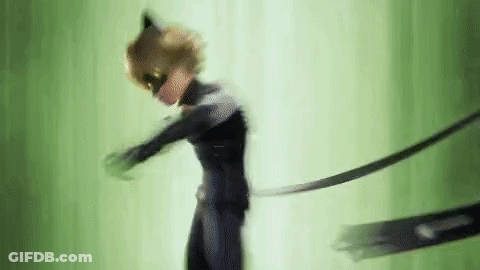 A Man In A Catsuit Is Standing In Front Of A Green Background And Holding A Sword . GIF