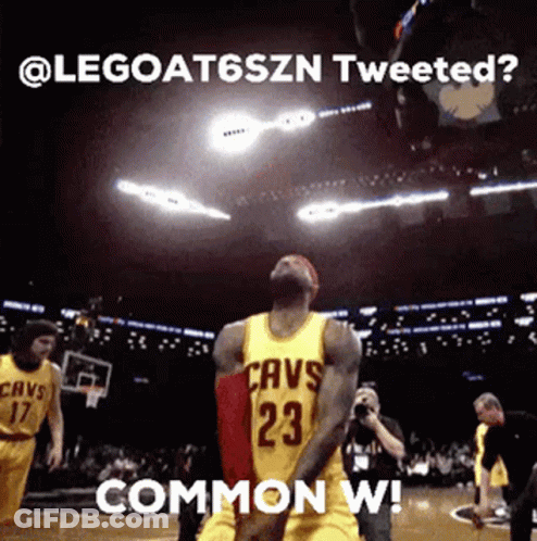 A Man In A Cavs Jersey Is Jumping In The Air GIF