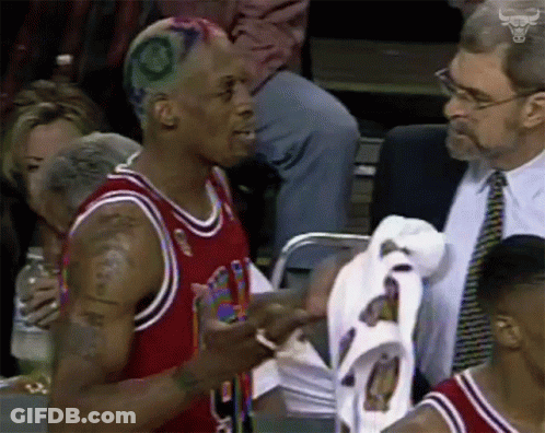 A Man In A Chicago Bulls Jersey Talking To Another Man GIF