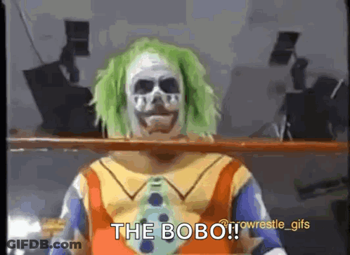 A Man In A Clown Costume Is Standing In Front Of A Shelf And Says `` The Bobo '' . GIF