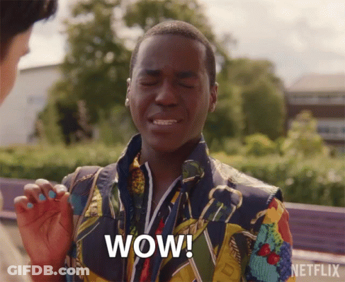 A Man In A Colorful Jacket Says Wow In A Netflix Ad GIF