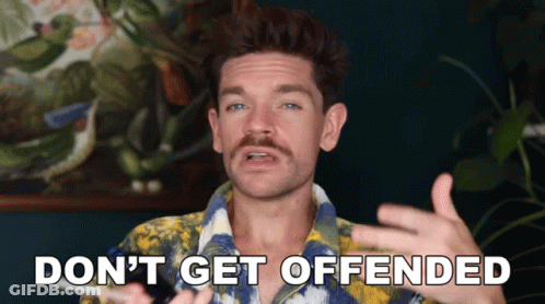A Man In A Colorful Shirt Says " Don 'T Get Offended " GIF