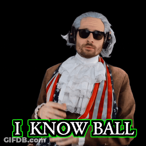 A Man In A Confederate Flag Costume Is Holding A Basketball In Front Of A Sign That Says I Know Ball GIF