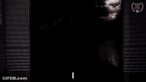 Man In Costume With Film Festival Award GIF