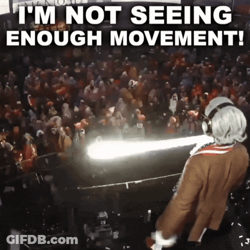 A Man In A Costume Is Standing In Front Of A Crowd With The Words I 'M Not Seeing Enough Movement Above Him GIF