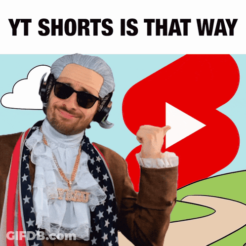 A Man In A Costume With The Words Yt Shorts Is That Way Below Him GIF