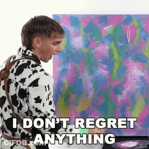A Man In A Cow Print Jacket Is Painting A Picture And Says `` I Don T Regret Anything '' . GIF