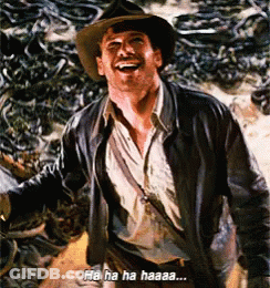 A Man In A Cowboy Hat And Leather Jacket Is Laughing And Says Ha Ha Haaaa GIF