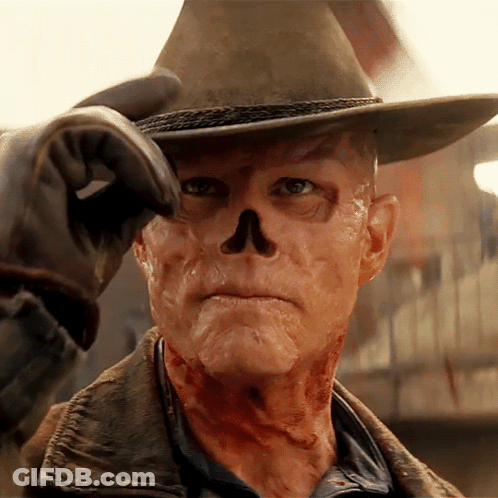 A Man In A Cowboy Hat Has A Skull On His Face GIF