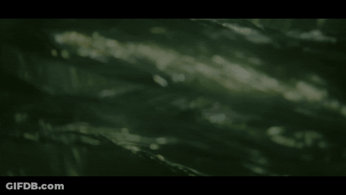A Man In A Cowboy Hat Is Behind A Barbed Wire Fence GIF