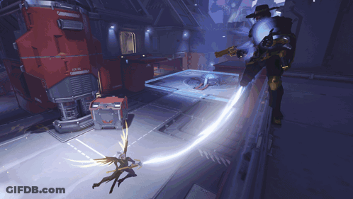 A Man In A Cowboy Hat Is Holding A Gun In A Room GIF