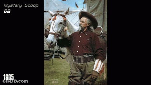 A Man In A Cowboy Hat Is Holding A Horse With The Year 1905 On The Bottom GIF