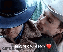 A Man In A Cowboy Hat Is Hugging Another Man In A Cowboy Hat . GIF