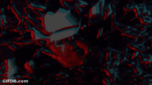 A Man In A Cowboy Hat Is Laying In A Pile Of Pieces Of Glass GIF