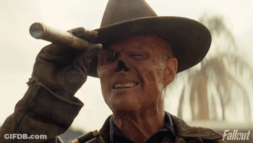 A Man In A Cowboy Hat Is Looking Through A Telescope With Fallout Written In The Corner GIF