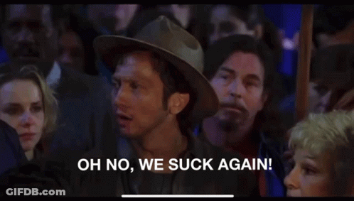A Man In A Cowboy Hat Is Saying Oh No We Suck Again GIF