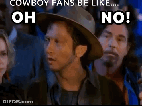 A Man In A Cowboy Hat Is Standing In Front Of A Crowd Of People And Says Oh No . GIF
