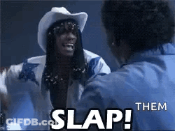A Man In A Cowboy Hat Is Talking To Another Man In A Blue Shirt And Says `` Slap Them '' . GIF