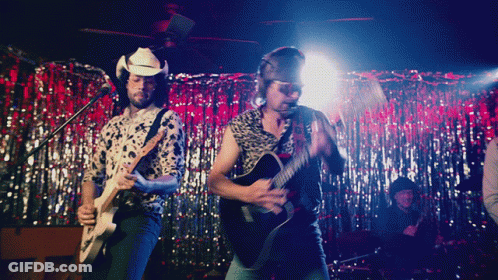 Man In Cowboy Hat Playing Guitar GIF