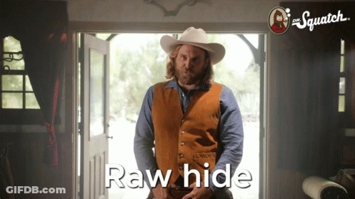 A Man In A Cowboy Hat Stands In Front Of A Door With The Words Raw Hide Written On The Bottom GIF