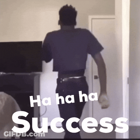 A Man In A Crop Top Is Standing In Front Of A Wall That Says Ha Ha Ha Success GIF