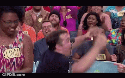 A Man In A Crowd With A Name Tag That Says Lindm GIF