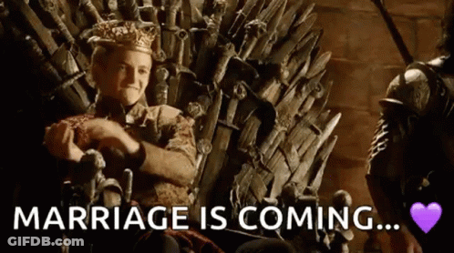 A Man In A Crown Is Sitting On A Throne With The Words `` Marriage Is Coming '' Written On It . GIF