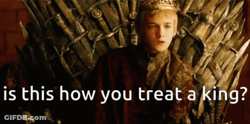 A Man In A Crown Sits On A Throne With The Words " Is This How You Treat A King " GIF