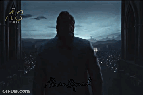 A Man In A Dark Room With The Word May Written On It GIF