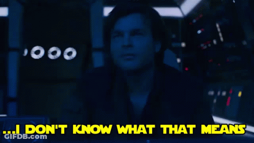A Man In A Dark Room With The Words " I Don T Know What That Means " GIF