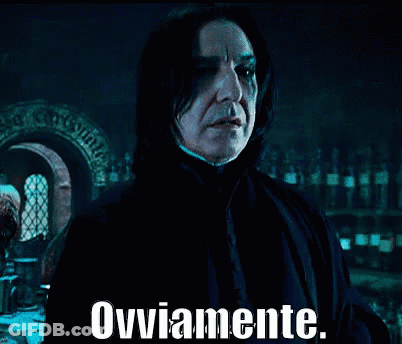 A Man In A Dark Room With The Words Ovviamente Written On The Bottom GIF