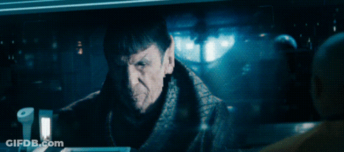 A Man In A Dark Room With The Words That Being Said Above Him GIF