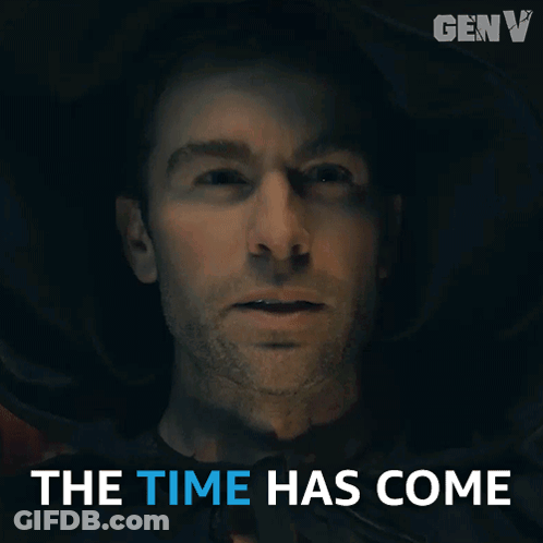 A Man In A Dark Room With The Words The Time Has Come GIF